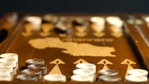 Throwing dices to backgammon board Stock-Footage 94071099