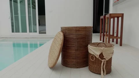 Throwing dirty laundry inside laundry basket Stock Footage 172481807