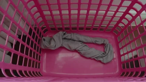 Throwing dirty man underpants in clothes basket. Stock Footage 237221608