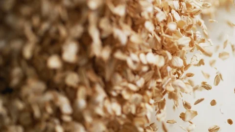 Throwing dried oats. Slow Motion. Stock Footage 94082927