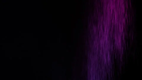 Throwing flour on a black background. Pink purple dust explosion effect. Stockbeeldmateriaal 303546873