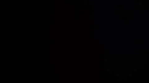 Throwing flour on a black background. Pink purple dust explosion effect. Stock Footage 303546876