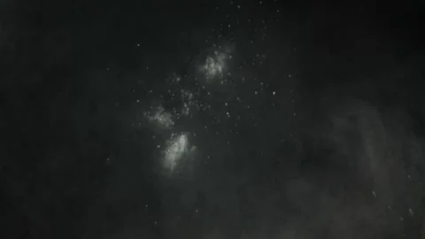 Throwing flour on a black background. White dust explosion effect Stock Footage 237480555