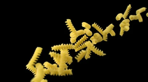 Throwing fusilli pasta, Slow Motion Video stock 31819584