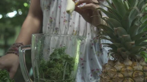Throwing one banana in a blender Stock Footage 43131886