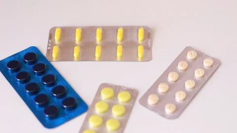 Throwing packs with medicine on rotating surface Video stock 86894463