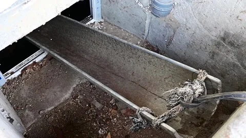 Throwing pieces of firewood into the basement. Stock Footage 228112778