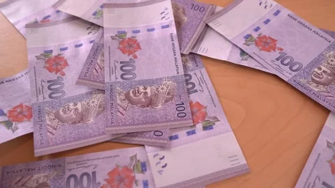 Throwing piles of Ringgit Stock Footage 295103670