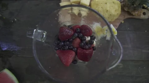Throwing Pinneapple in a blender 2 Stock Footage 43134011