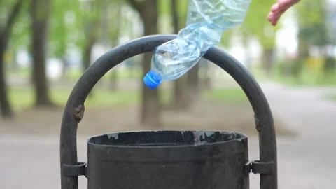 Throwing plastic bottle into the garbage can in slow motion 180fps 스톡 동영상 155611926