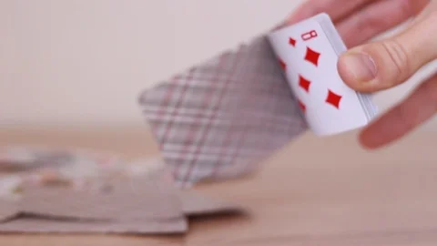 Throwing playing cards on the table 動画素材 93336599