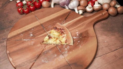 Throwing slices of pizza in 4K Stock Footage 137485821