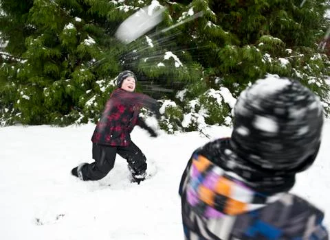 Throwing snowball Stock Photos