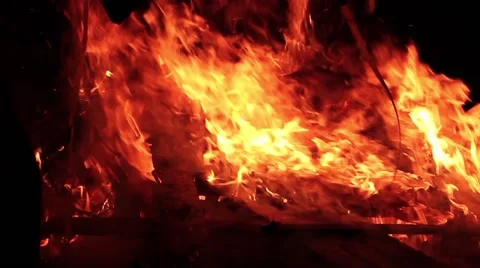 Throwing things on bonfire slow motion 2 Stock Footage 45368285