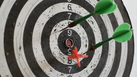Throwing three darts into the target aim and missing a ten points circle Stock Footage 119195086