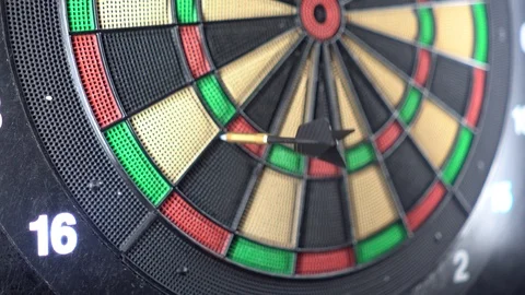 Throwing three darts into the target aim and missing a ten points circle. Video stock 124698807