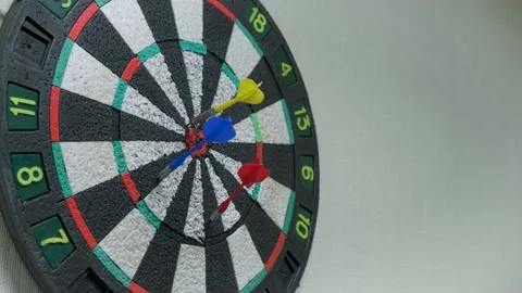 Throwing three darts into the target aim and missing a ten points circle. 4k UHD Video stock 149230832