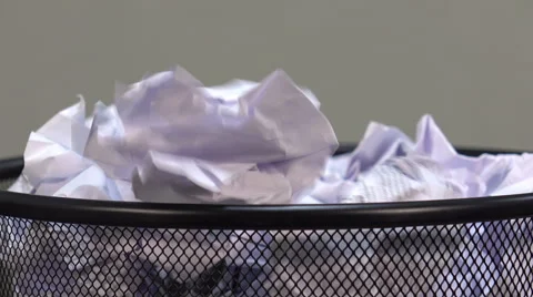 Throwing useless paper into the wastebasket Stock Footage 62493120