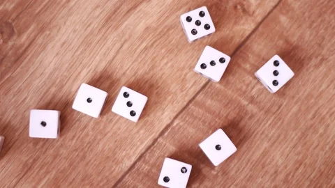 Throwing white dice on floor Stock Footage 98480309