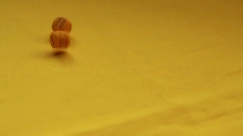 Throwing yellow dice, one and six Stock Footage 89322024
