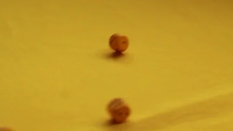 Throwing yellow dice, two and four Stock Footage 89322193