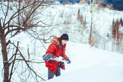 Throws snow shovel Stock Photos