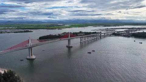 Thuan An Bridge road deck with traffic aerial view 4K Stock Footage 339861037