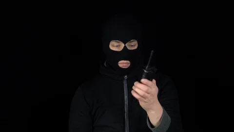 Thug speaks on the phone Stock Footage 124225845