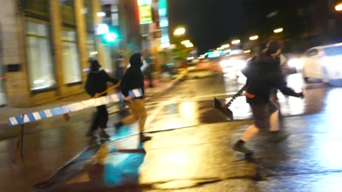 Thugs blocking car with obstacles and objects are result of protest turned awry Stock Footage 137553633