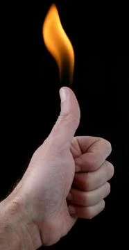 Thumb and flame 스톡 사진