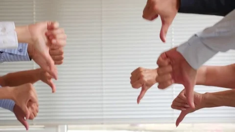 Thumb down hand sign on a white background. Space for a copy, a group of Stock Footage