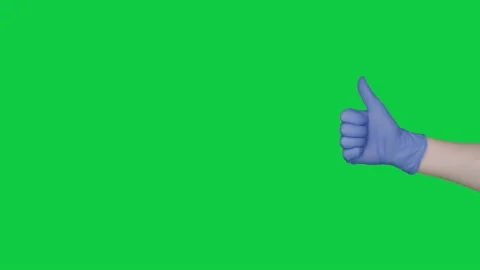 Thumb up gesture. Isolated blue nitrile glove on green screen chroma key Stock-Footage 140638008