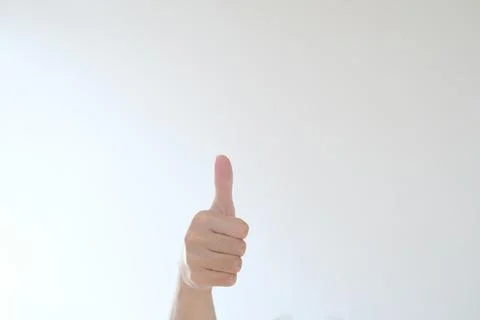 A thumb up hand Stock Photos