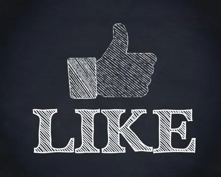 Thumb up icon on black wall Stock Photos