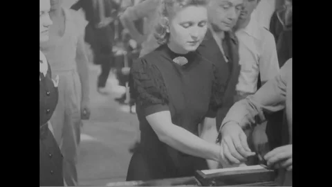 Thumb impressions of people casted as process of voting, sorting of votes - 1937 Video stock 107364852