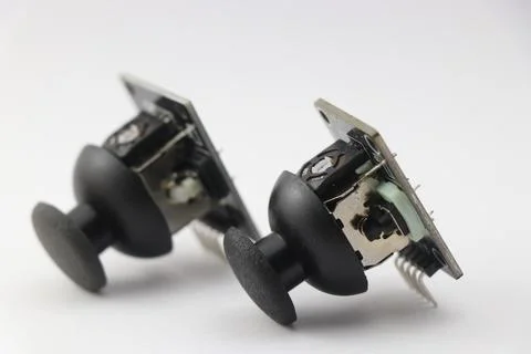 Thumb joystick button or dual axis joystick module on white background 스톡 사진