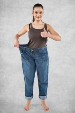 Thumb up for lost weight Stock Photos