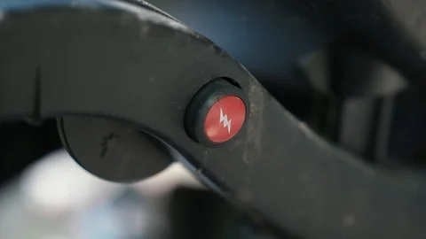 Thumb pushes ignition starter twice switch on Grill outdoor in summer Garden Stock Footage 95032899