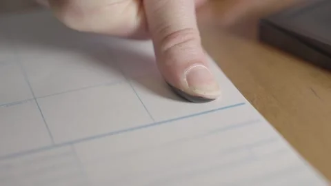 Thumb puts fingerprint on document close up Stock Footage 249290485