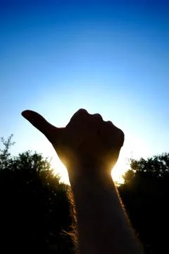 Thumb Up on the Sky Stock Photos