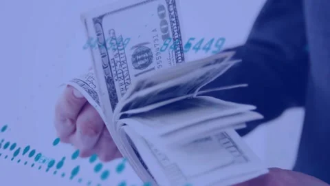 Thumb starting riffle, hands fanning cash while teal waveform and numeric labels Stock Footage 328396342