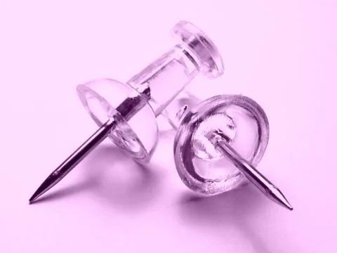 Thumb tacks in pink Stock Photos