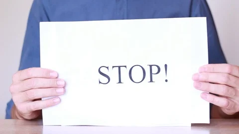 Thumbing through warning inscriptions Video stock 92936573