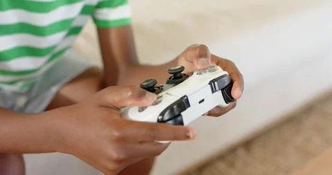 Thumbs are settling on sticks, hands are pressing triggers and tapping buttons Stock Footage 341937536