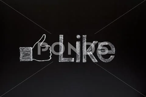 Thumbs up on blackboard Stock Photos