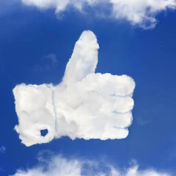 The thumbs up from clouds Stock Photos