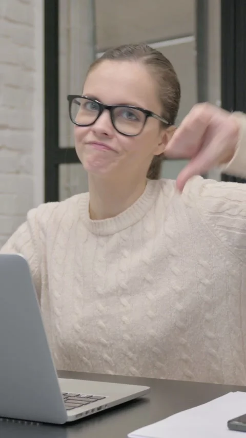 Thumbs Down by Creative Woman Using Laptop, vertical video Stock Footage 325831681