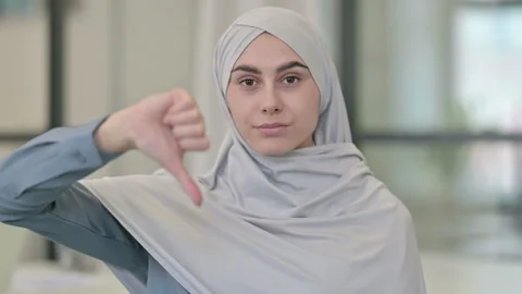 Thumbs Down Gesture by Young Arab Woman 스톡 동영상 152519316