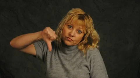 Thumbs down girl Stock Footage 12115693