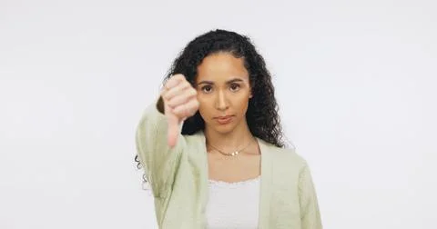 Thumbs down, space and portrait of woman in studio with unhappy, disappointed Stock Photos